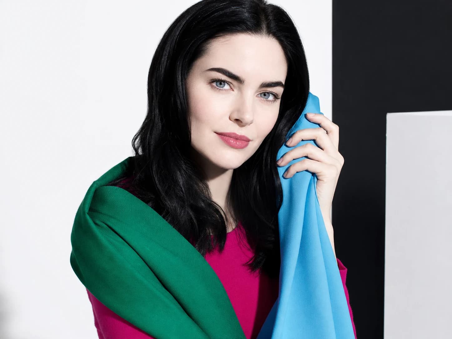 Bright winter colors on a high-contrast, porcelain-and-black-hair model in a StyleCard editorial portrait